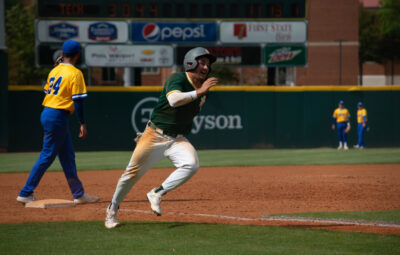Happy Man Running to Base