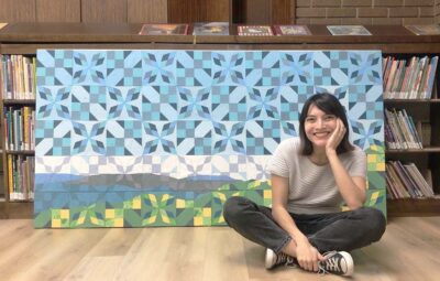 Jade Hoyer in Front of Her Art Piece