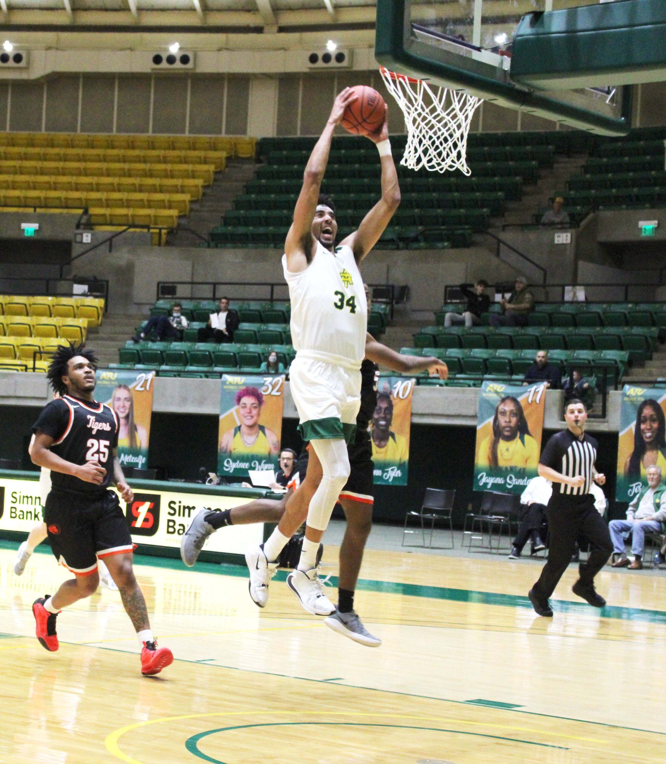 Wonder Boys Basketball Player Going for a Slam Dunk