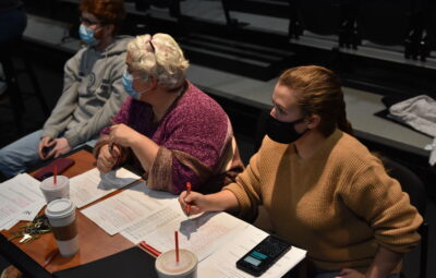 Bri DeClue and Others in Front of the Script