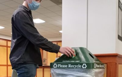 ATU Student Recycling a Can