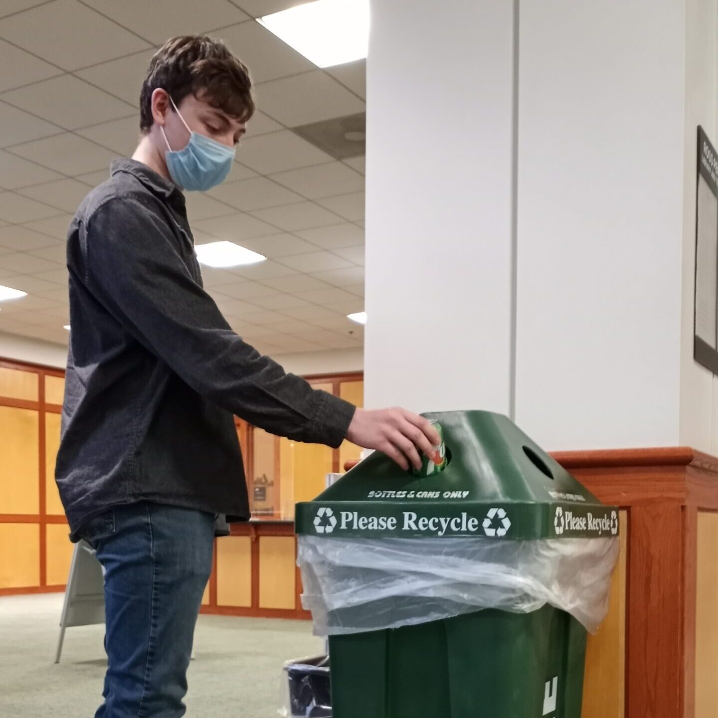 ATU Student Recycling a Can