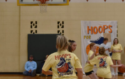 Women playing basketball at Hoops 4 Hearing