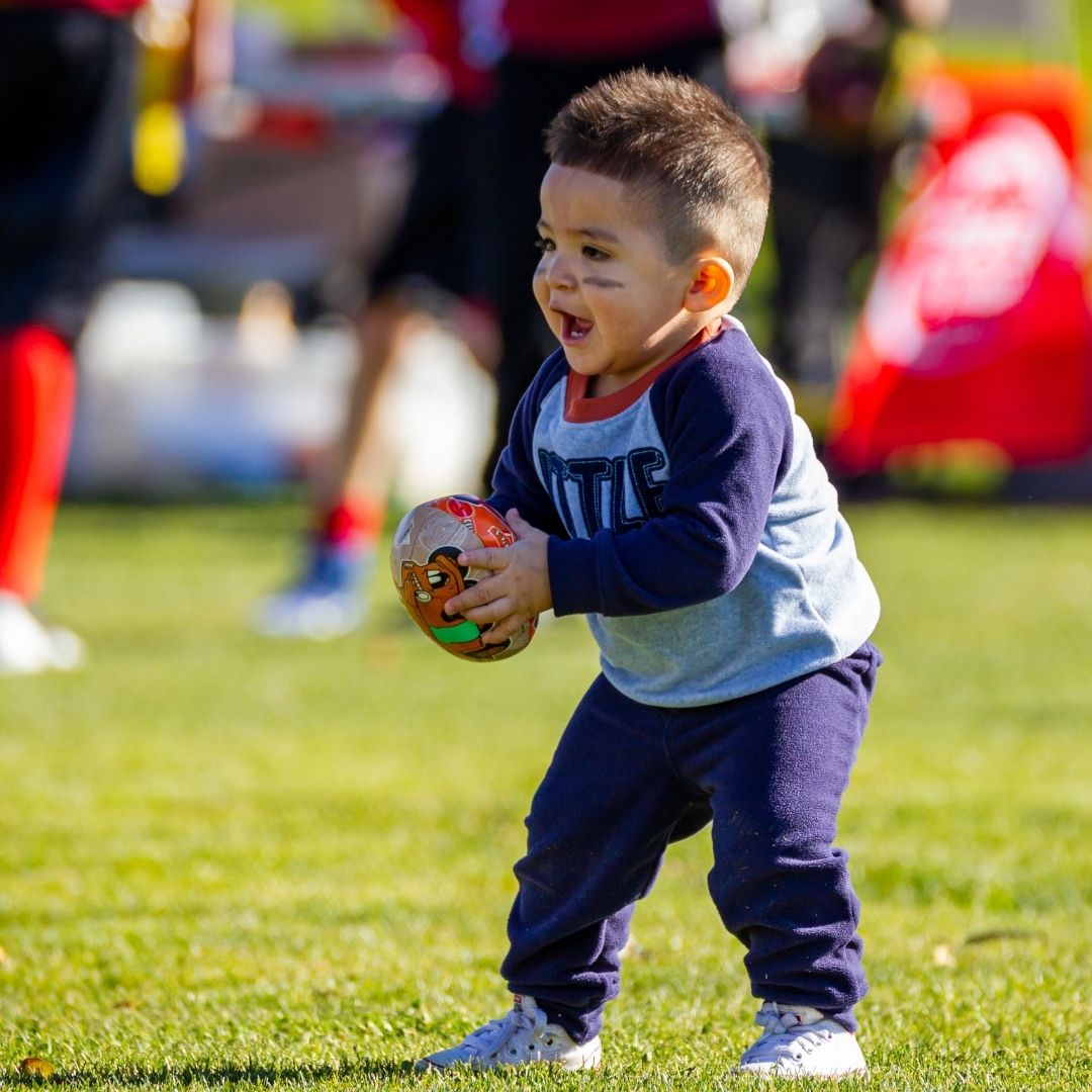 Kid With Football