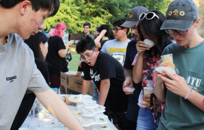 Students Enjoying Moon Cakes at the Mid-Autumn Festival