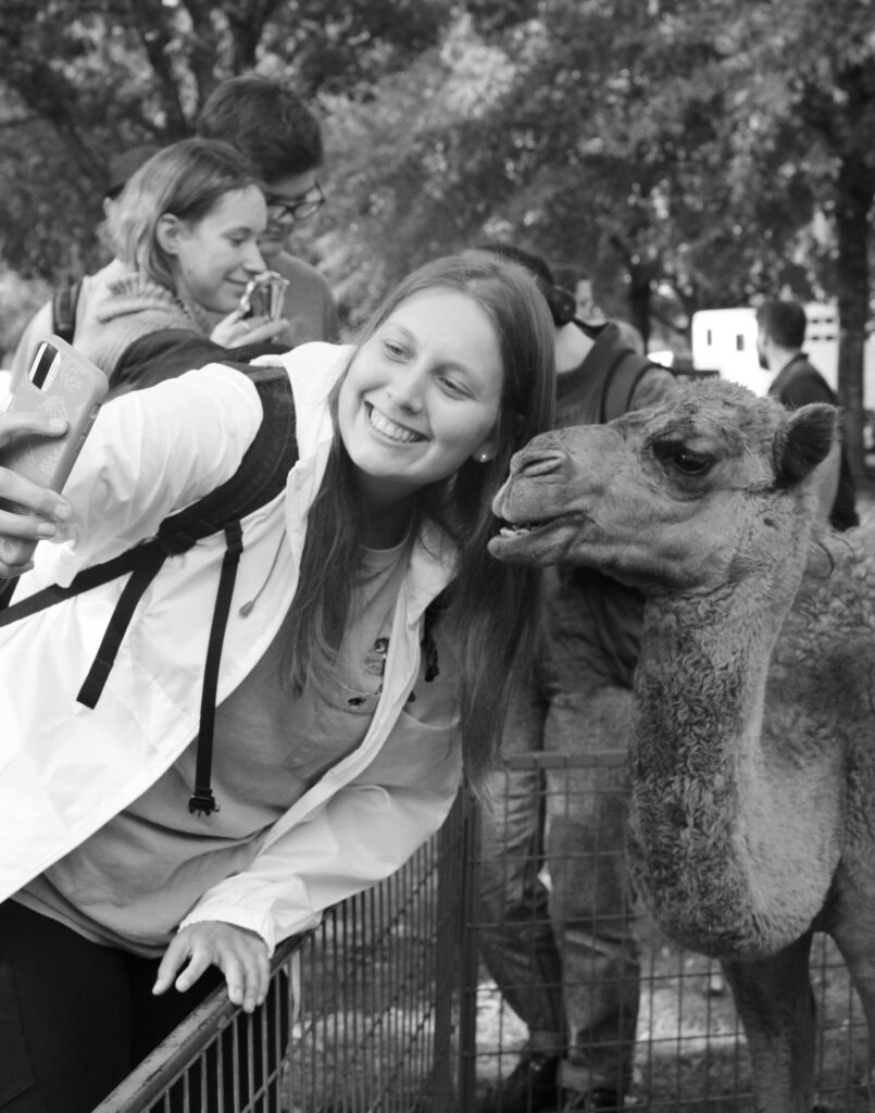 Student Taking Selfie With Camel