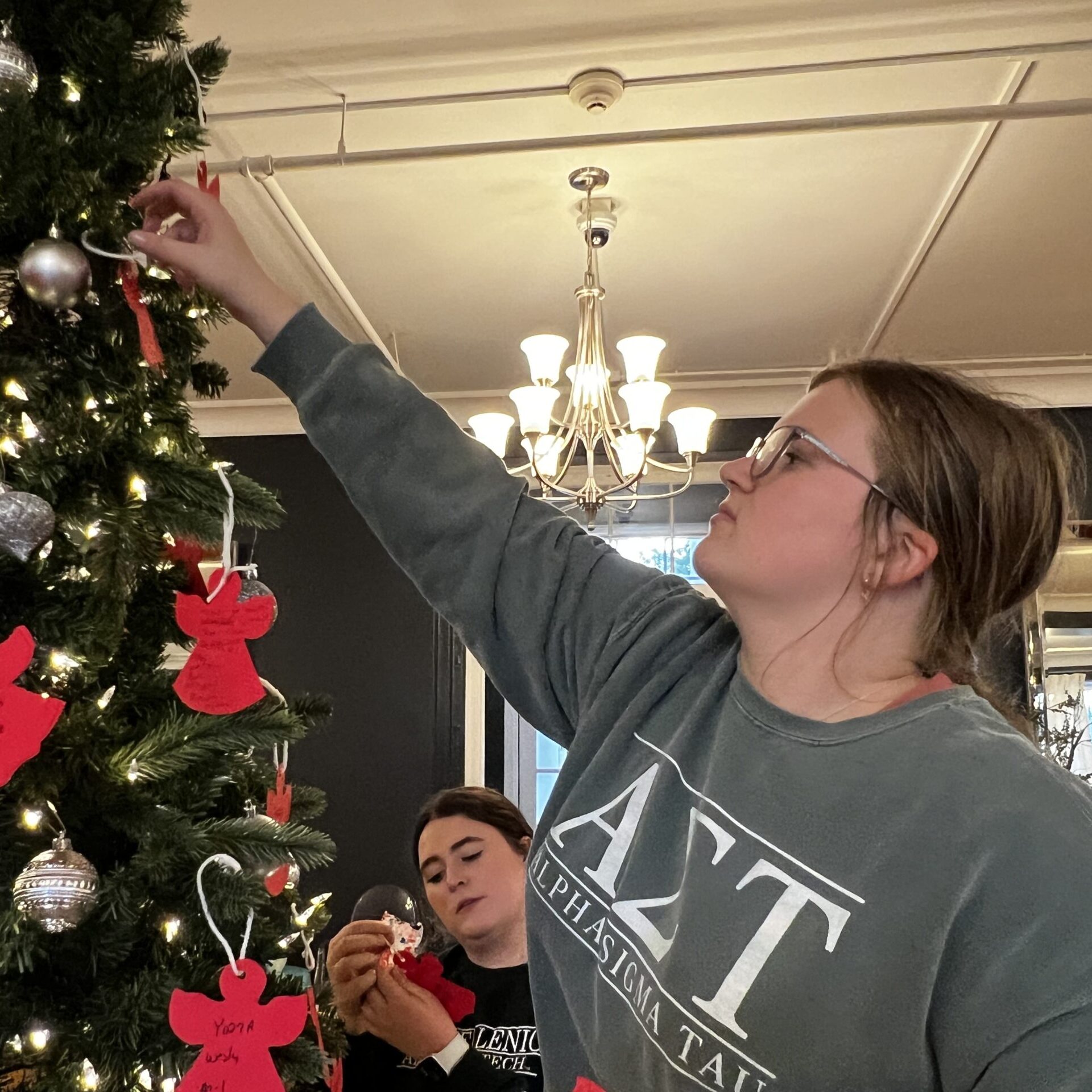 Picking an angel from the angel tree