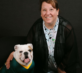 Dr. Kaethe Hoheling poses with Jerry the Bulldog